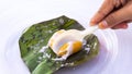 Close up of Pumpkin Koci or Kuih Koci Labu, the Malay glutinous rice flour made of pumpkin Royalty Free Stock Photo