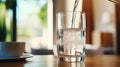 Close-up of purified fresh water pouring from bottle on living room table, Ai Generated