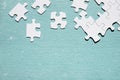 A close up of puzzle pieces. white jigsaw puzzle piece blue textured Royalty Free Stock Photo