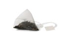 Close-up pyramid tea bag with black earl gray tea isolated on white background Royalty Free Stock Photo