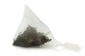 Close-up pyramid tea bag with black earl gray tea isolated on white background Royalty Free Stock Photo