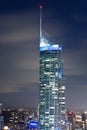 Close up of Q1 building at night