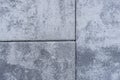 close up of a quartet of speckled gray paving stones forming a textured surface for architecture, construction, and Royalty Free Stock Photo