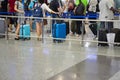 Close up queue of Asia passengers in line at boarding gate at airport