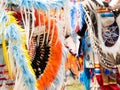 Close Up of Quill and Orange, Blue and Yellow Feather Bustle at Pow Wow Royalty Free Stock Photo