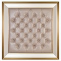 Elegant quilted beige leather with intricate button pattern in golden frame on white background Royalty Free Stock Photo
