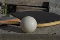 Close-up of a racket and ball for playing table tennis with a soft background Royalty Free Stock Photo