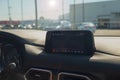 Close Up radio display, screen, of navigation device screen of navigation device inside a car dashboard On a hot day Royalty Free Stock Photo