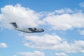 Close up of an RAF Airbus A400 military transport plane flying across a blue sky in Portland, Dorset, UK