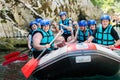 Close up of rafting team on the boat with full equipment Royalty Free Stock Photo