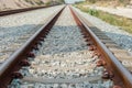 Close up rail joint, rail anchor with perspective line from railroad  tracks. Safety transportation. Avoid traffic jam. Royalty Free Stock Photo