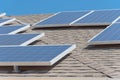 Solar panel installation on asphalt shingles rooftop Royalty Free Stock Photo