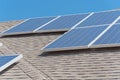 Solar panel installation on asphalt shingles rooftop Royalty Free Stock Photo