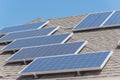 Solar panel installation on asphalt shingles rooftop Royalty Free Stock Photo