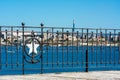 Close up of the railing in Taranto on blurred industrial site called Ilva background Royalty Free Stock Photo