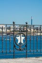 Close up of the railing in Taranto on blurred industrial site called Ilva background Royalty Free Stock Photo