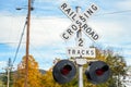 Close up of a railroad crossing sign with lights