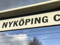 Close up of Railroad sign at NykÃÂ¶ping central station, Sweden. Dark letters on white background