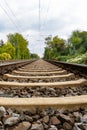 Close-up of railroad tracks leading straight foreward to infinity Royalty Free Stock Photo