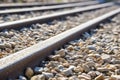 close-up of a railway track detail with grit stones Royalty Free Stock Photo