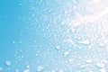 Close up rain water drops on blue sponge surface as abstract background Royalty Free Stock Photo