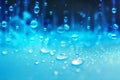 Close up rain water drops falling on blue sponge surface as abstract background Royalty Free Stock Photo