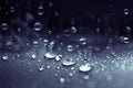 Close up the rain water drops falling on blue sponge surface as Royalty Free Stock Photo