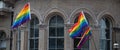 Close up of rainbow LGBT flags flying at the Gay Pride Parade in London 2018. Photographed outside The Langham Hotel