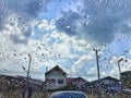 Close-up, raindrops, rain on the car glass, dark sky background, rainy season, abstract, natural background Royalty Free Stock Photo