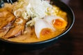 Close up Ramen Pork Bone Soup Tonkotsu Ramen with Chashu Pork, Scallion, Sprout, Corn, Dried Seaweed and boiled egg.