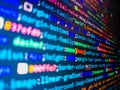 Close up of random computer code comprised of numbers and letters. Developing programm. Computer interface. Programmer Typing Royalty Free Stock Photo