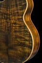 Close up of rare and highly figured Brazilian rosewood on back of acoustic guitar