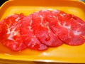 Close up of Rare Slices beef for japanese yakiniku barbecue or Korean barbecue grilling