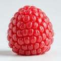 Close-up of a raspberry with vibrant red drupelets clustered together, featuring tiny stem-