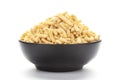 Close up of Ratlami Besan sev plane and salty Indian namkeen snacks on a ceramic black bowl. Royalty Free Stock Photo