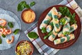 Raw Asian spring rolls on a plate Royalty Free Stock Photo