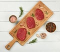 Close up raw beef tenderloin steak on board Royalty Free Stock Photo