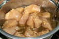 Close Up of raw chopped chicken marinating Royalty Free Stock Photo