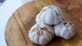 Close up raw garlic on a cutting board Royalty Free Stock Photo