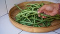 Close up of raw green beans in a basket Royalty Free Stock Photo