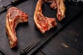 Close-up raw lamb ribs. Halal meat. Raw meat. Lamb rack on a dark rustic background. Salt and spices. Halal food still life Royalty Free Stock Photo