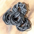 Close up of raw pasta, Black Squid ink fettuccine Royalty Free Stock Photo