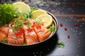 Close up Raw salmon sashimi salad with fresh lemon and herbs
