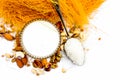 Close up of Raw vermicelli or sevee or seviyan or seviyaan and dry fruits isolated on white with a bowl of milk used to make kheer