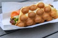 Close up of a bubblewrap or bubble waffle smoked salmon sandwich in London, UK Royalty Free Stock Photo