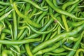 Ready to eat green peppers in market stall Royalty Free Stock Photo