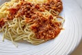 Close up spaghetti with sauce on white plate Royalty Free Stock Photo