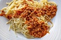 Close up spaghetti with sauce on white plate Royalty Free Stock Photo