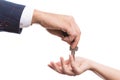 Close-up of realtor hand giving keys