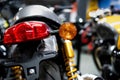 Close up of the rear of a brand new clasic motorcycle, soft focus, abstract background - Image